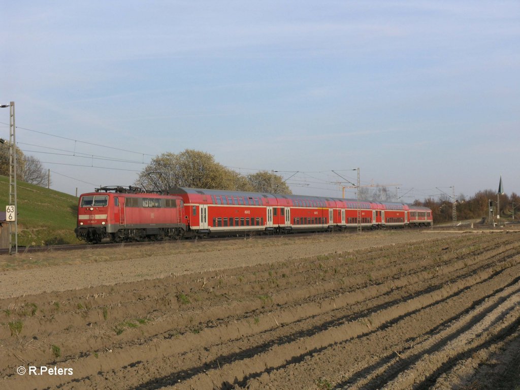 111 066-7 zieht die RB59182 Mnchen - Ingolstadt Nord bei Fahlenbach. 24.03.11