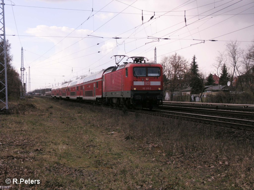 112 110-2 zieht den RE1 Eisenhttenstadt bei Berlin-frierichshagen. 19.03.08