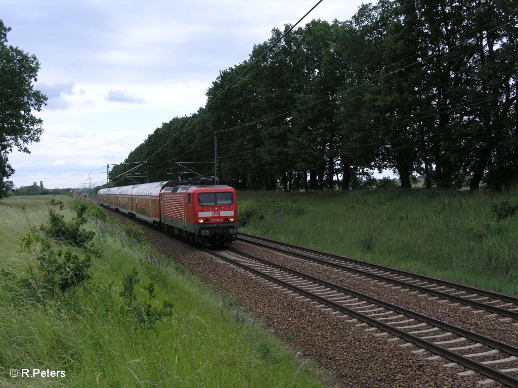 114 030-0 zieht bei Jacobsdorf(Mark) den RE38017 Eisenhttenstadt. 29.05.09
