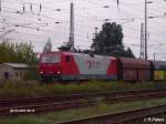 Arcelor 143 001 mit einem leeren Kohlezug in Eisenh�ttenstadt am 22.08.07