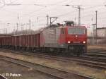 Arcelor Am 6.2.08 zieht 143 001-6 ein Kohlezug durch Eisenh�ttenstadt. 