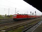 143 306-9 shciebt den RB11 Frankfurt/Oder in den Bahnhof Eisenhttenstadt. 21.04.10