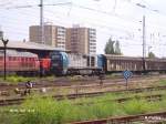 OHE Osthannoversche Eisenbahnen AG/29829/g2000-der-ohe-steht-mit-ein G2000 der OHE steht mit ein Gedeckten Gterzug in Eisenhttenstadt. 06.06.07