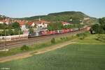 193 657-4  Wir bringen die Kraft von 8700 Pferde auf die Schiene  zieht mit einem Wechselpritschen Gruber Zug durch Retzbach-Zellingen.