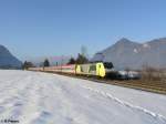Dispo E189 993 zieht ein EC83 nach Verona bei niederaudorf. 18.02.10
