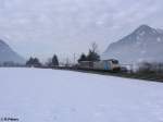 Locomotion E186 104 schiebt den Zug von 139 133 bei Niederaudorf. 18.02.10