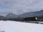 MRCE (Mitsui Rail Capital Europe) ES 64 F4-010 zieht kurz hinter Kufstein den EC87 nach Verona Porta Nuova. 18.02.10