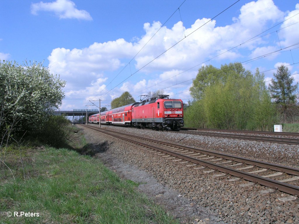 143 038-8 zieht RE10577 Leipzig  - Dresden Hbf bei Borsdorf. 16.04.11
