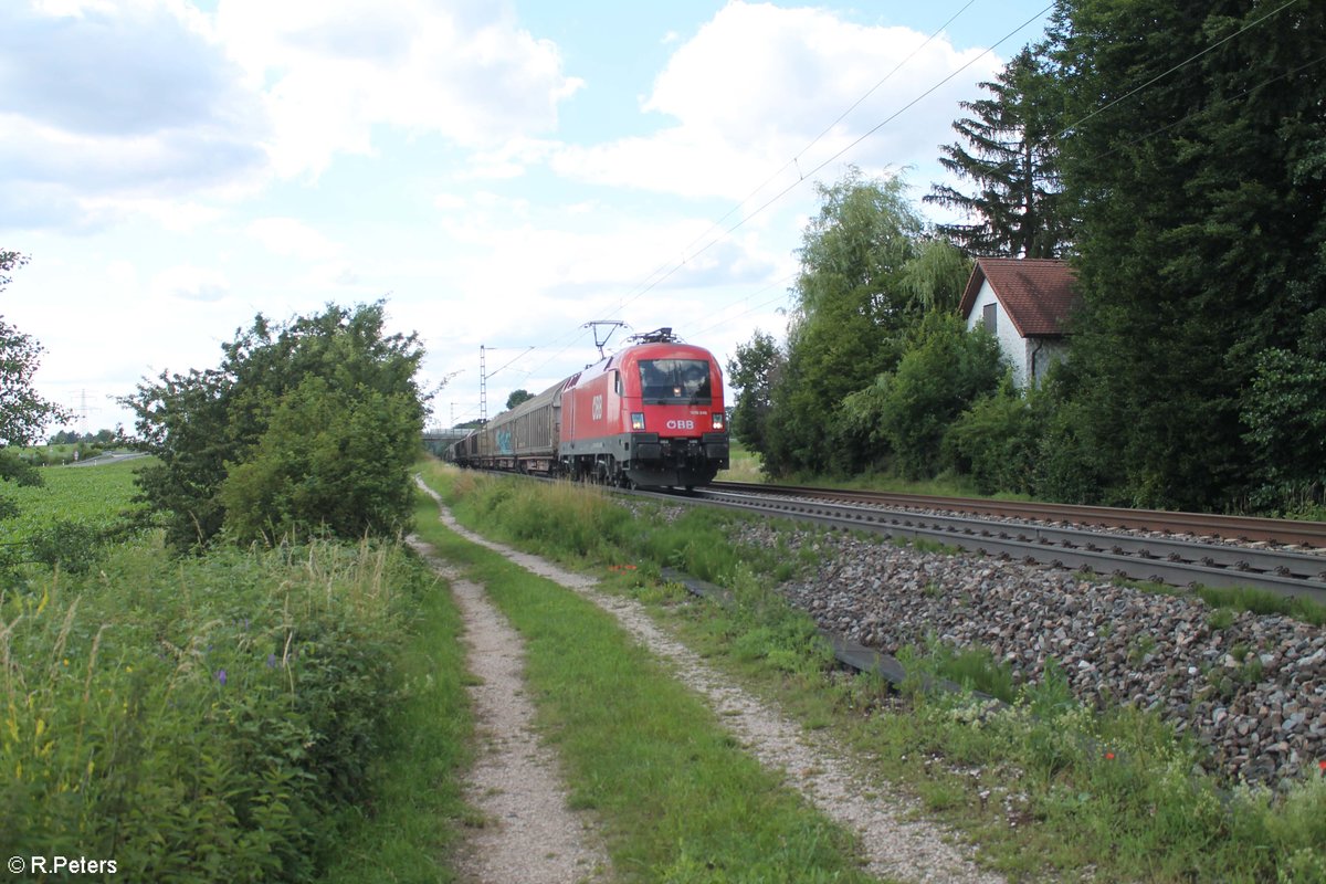 1016 045 mit einem gedeckten Güterzug bei Postbauer-Heng in Richtung Regensburg. 03.07.20