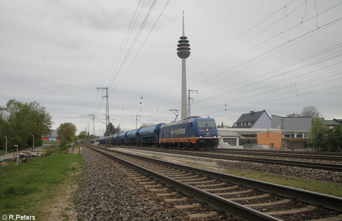 185 409 zieht mit einem Getreidezug durch Nürnberg Hohe Marter. 09.04.24