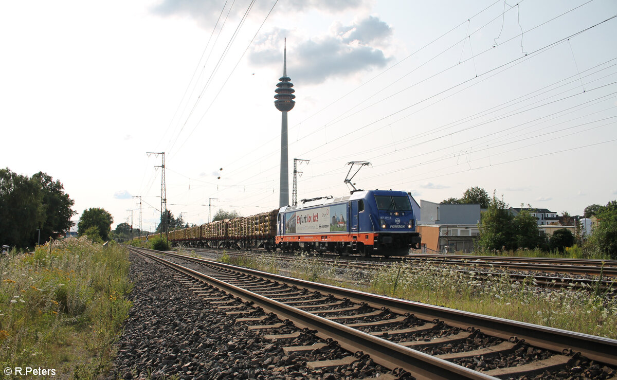 187 319-9 zieht mit einem Holzzug nach Deggendorf Hengersberg durch Nürnberg Hohe Marter. 24.07.24