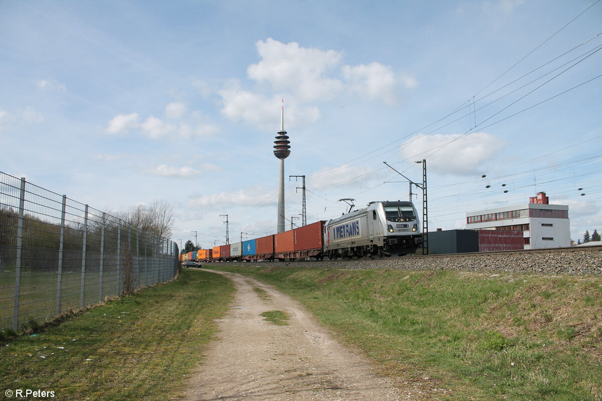 187 513-7 mit einem Containerzug in der Treuchtlinger Kurve in Nürnberg Hohe Marter. 25.03.25