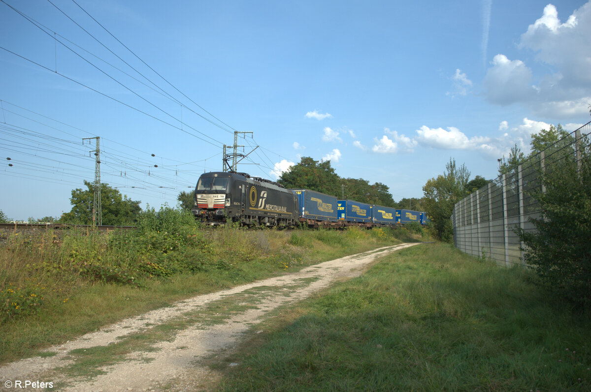 X4 E 705 zieht mit einem Wechselpritschenzug LKW-Walter durch die Treuchtlinger Kurve in Nürnberg Hohe Marter. 31.08.24