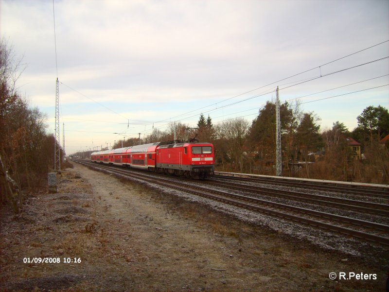 112 184-7 schiebt den RE1 Magdeburg bei berlin-Friedrichshain. 09.01.08