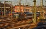 Re 4/4 II 11161 bei der Abfahrt mit IC 187 nach Zürich.