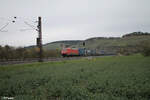 152 033-7 zieht ein LKW-Walterzug bei Himmelstadt in Richtung Süden. 28.03.24