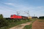 185 395-1 zieht bei der Netztrennstelle Mainz/Bischofsheim einen gemischten Güterzug.