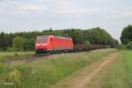 185 167-4 zieht bei der Stromkreistrennstelle Bischofsheim einen gemischten Güterzug.