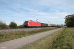 185 040-3 zieht bei Pölling mit einem gemischten Güterzug nach Nürnberg vorbei.