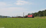 187 135 zieht mit einem gemischten Güterzug bei Oberdachstetten in Richtung Süden. 08.06.24
