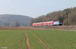 Nachschuss auf 146 247-2 die ihren RE 55 4614 Bamberg - Frankfurt/Main bei Gambach schiebt.