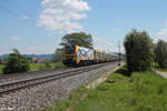 159 231  Zelos  mit einem Schwaiger Holzzug bei Pölling. 14.05.24