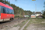 186 148-3 mit Hödlmayer Autotransportzug trifft auf 442 224-2 im S-Bahnverkehr in Ochenbruck.