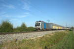 6193 130 zieht mit einem LKW-Walter bei Pölling in Richtung Norden.