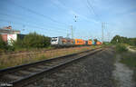 187 074-0  Containerterminal Motiv  zieht mit einem Containerzug durch Nürnberg Hohe Marter.