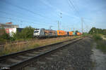 187 074-0  Containerterminal Motiv  zieht mit einem Containerzug durch Nürnberg Hohe Marter.