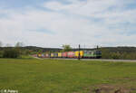 TX - Logistik/856456/193-275-5-unterwegs-im-auftrag-der 193 275-5 'Unterwegs Im Auftrag der Natur' mit einem Wechselpritschenzug bei Pölling. 28.04.24