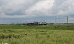 TX - Logistik/876190/193-997-pferde--193-212 193 997 'Pferde' + 193 212 'Driving Future' ziehen ein Löblein Container Müllzug bei Uffenheim in Richtung Süden. 27.05.24