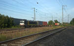 X4E 867 zieht mit einem Containerzug durch Nürnberg Hohe Marter.