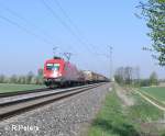 1116 030-6 mit einen gemischten Güterzug bei Moosham nach Passau.