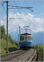 Der ABDe 8/8 4001 au dem Weg Richtung Montreux kurz nach Planchamp.