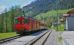 Deh 4/4 I 52 verlässt am 11.05.2024 den Bahnhof Münster in Richtung Brig
